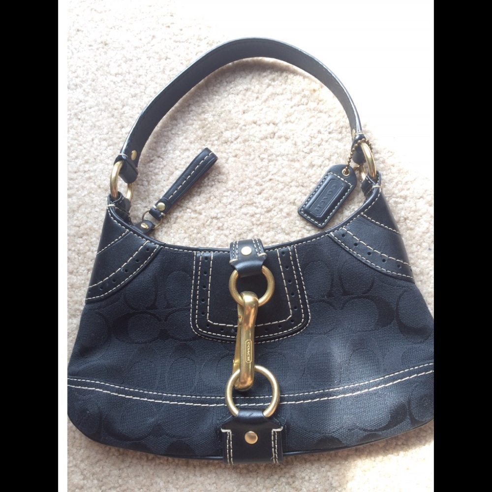 Coach Handbag. Never used. Black with gold.